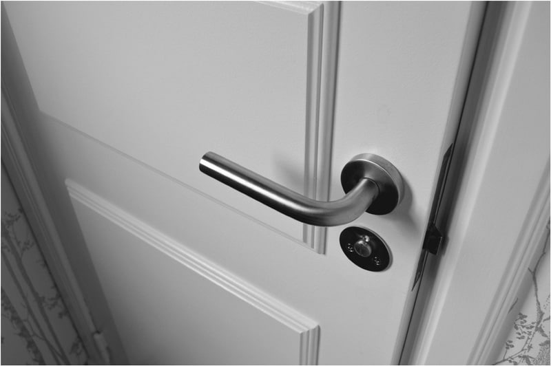 New door hardware from a home alteration, highlighting upgraded safety and accessibility features in a renovation.